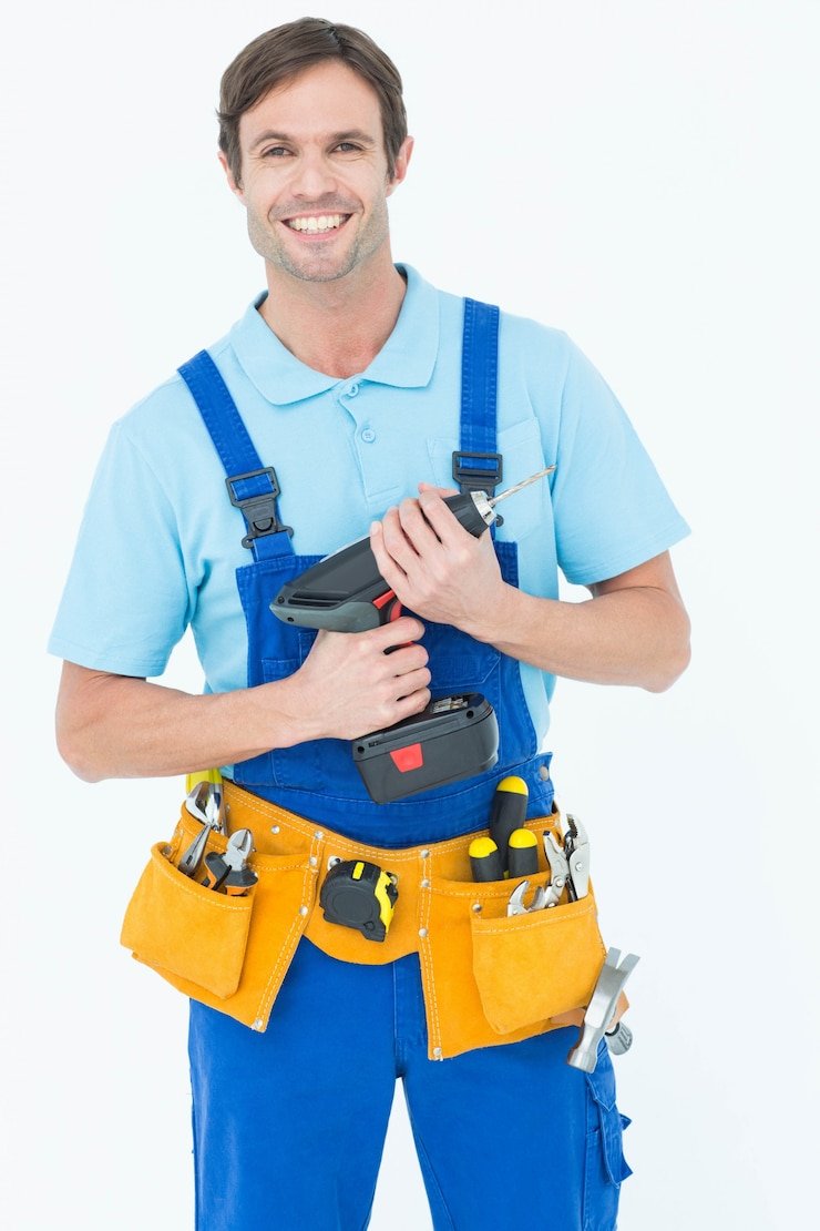 confident-carpenter-holding-drill-machine_13339-98800 confident-carpenter-holding-drill-machine_13339-98800